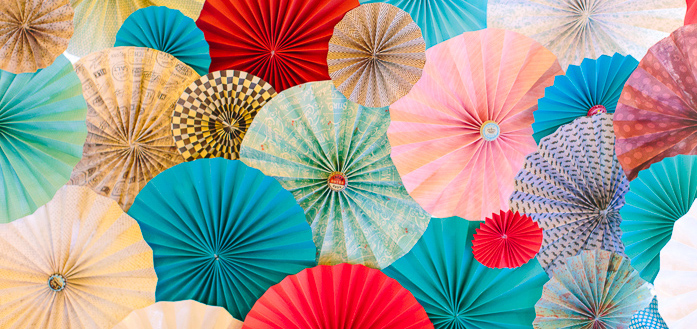 A colorful paper pinwheel backdrop