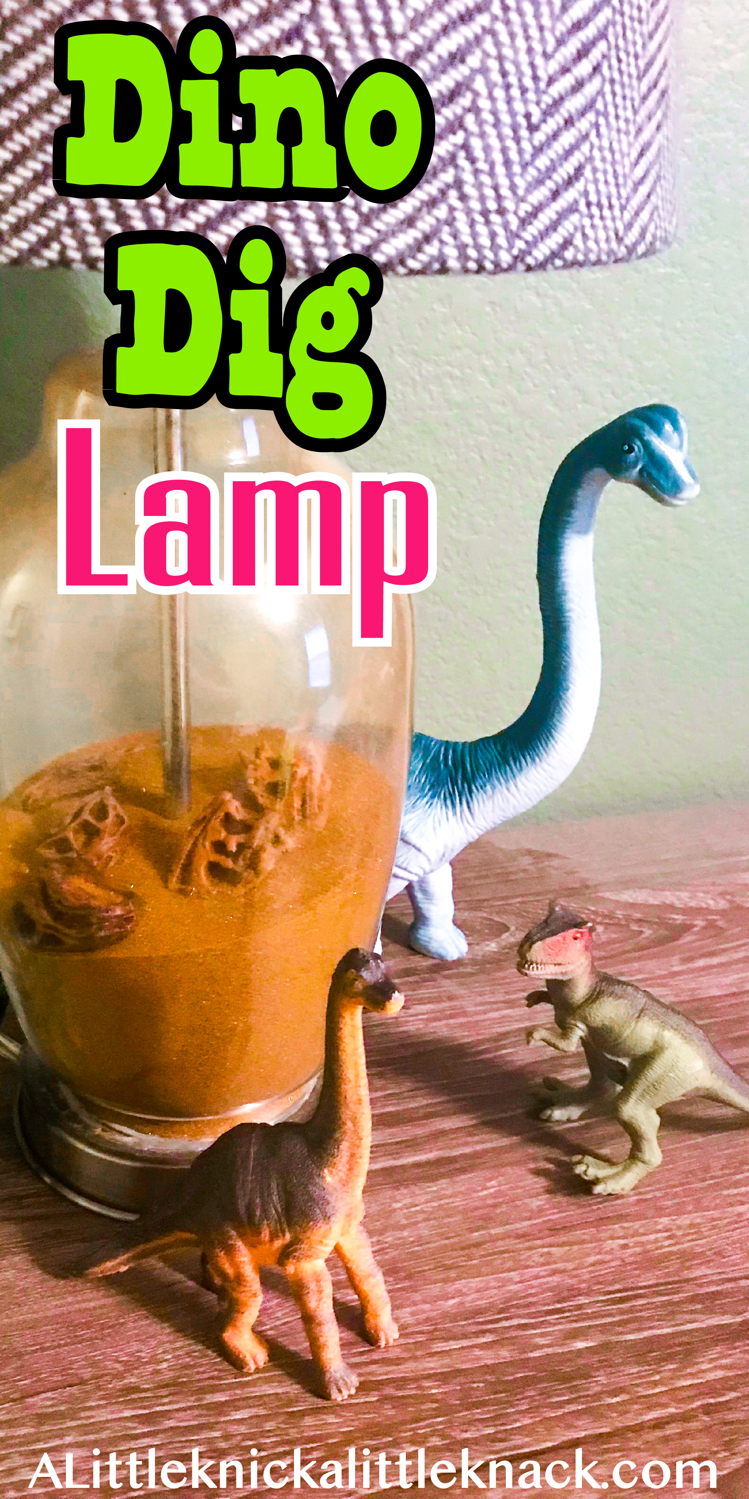 Dinosaur figurines surround a dinosaur lamp on a wooden surface. 