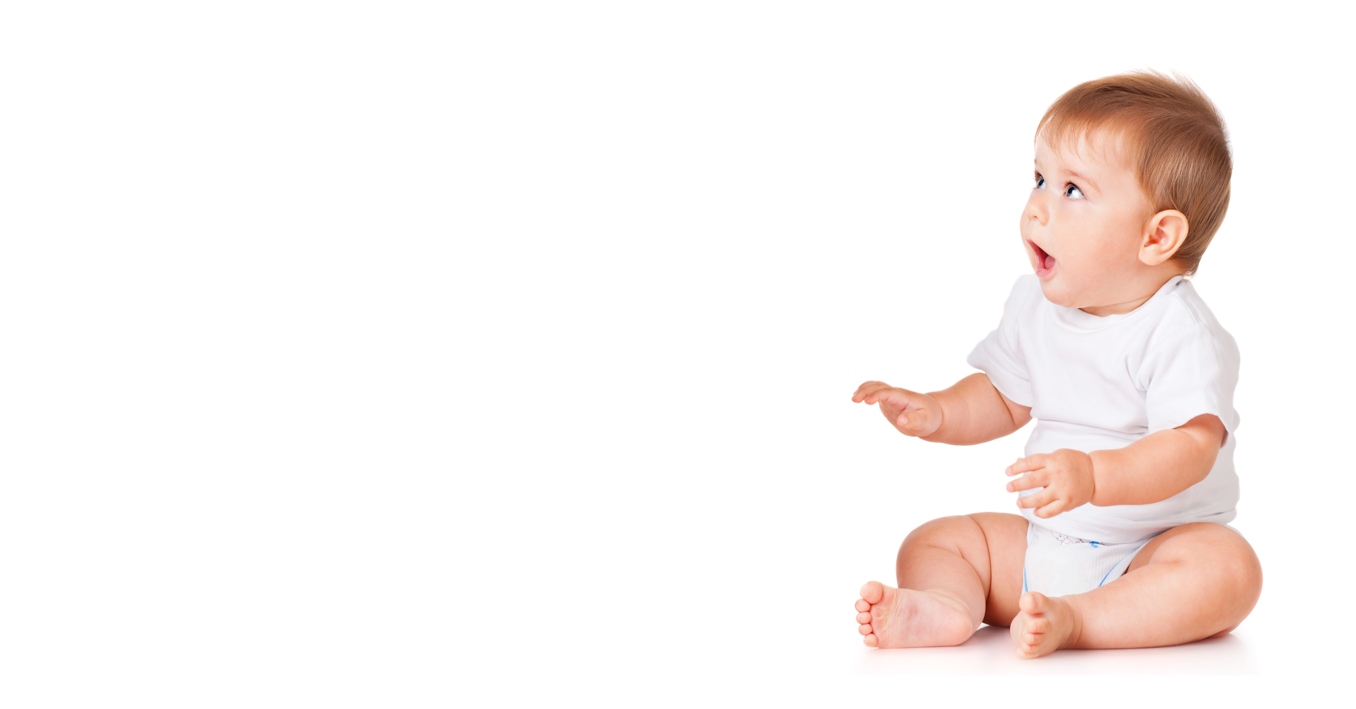 A surprised looking baby in a white shirt