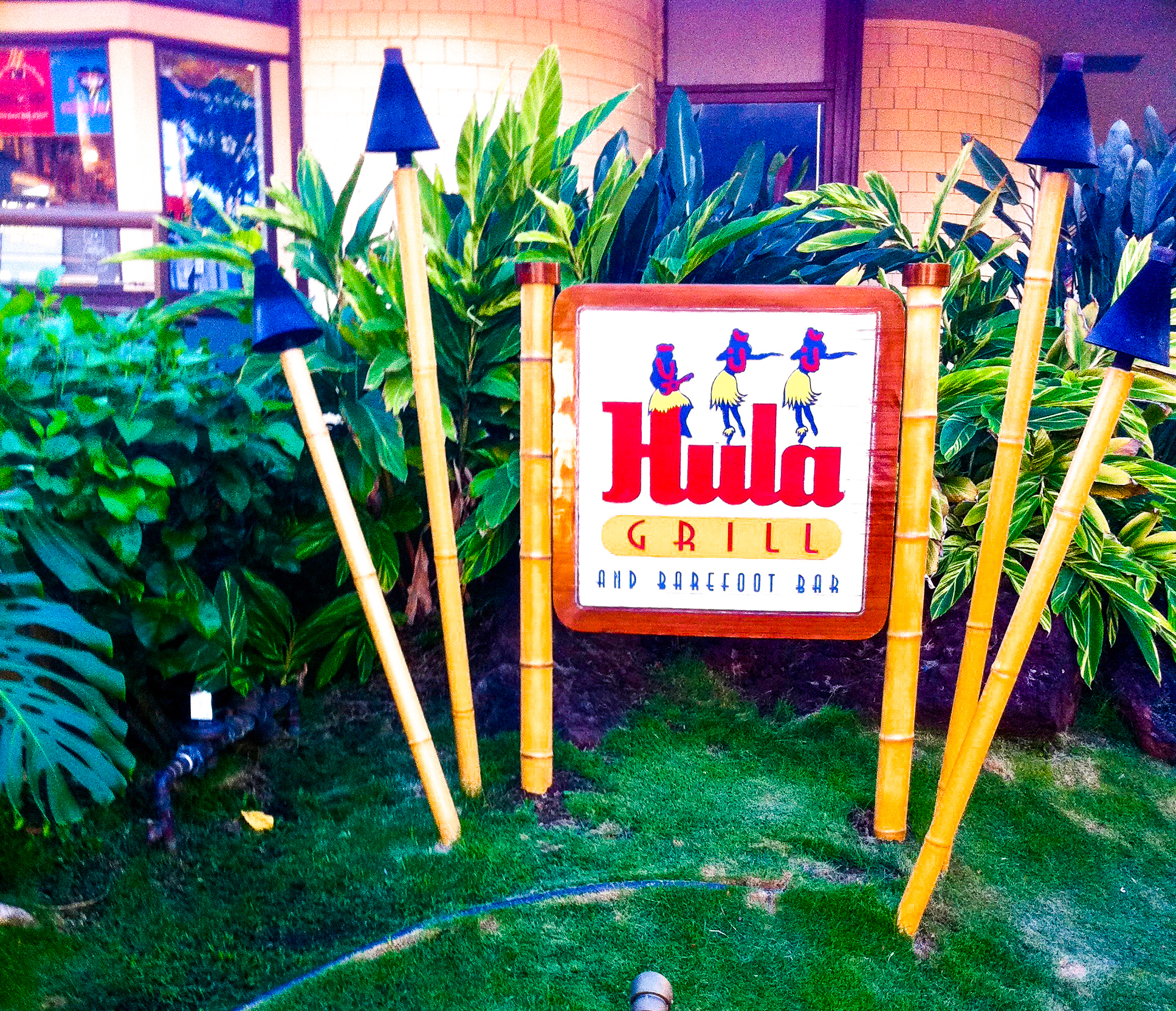 The sign in front of Hula hut grill 