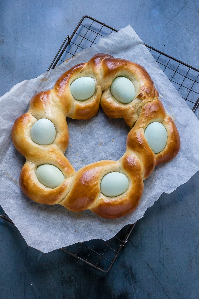 Braided bread circle with eggs nested in the braid. 
