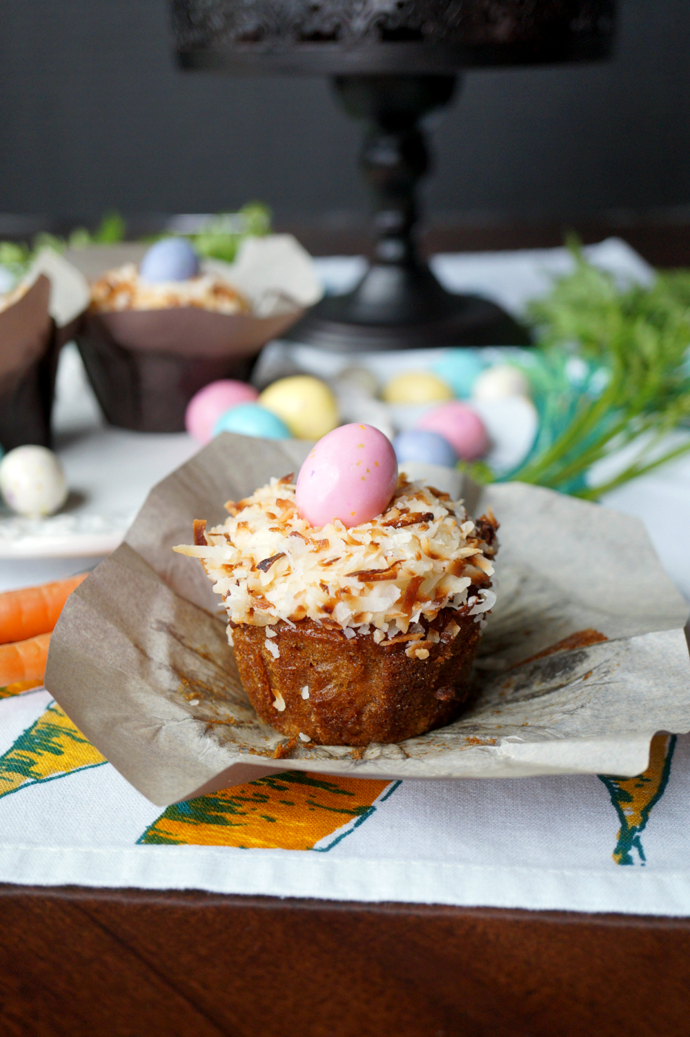 Coconut nest cupcakes with a colorful egg in the center